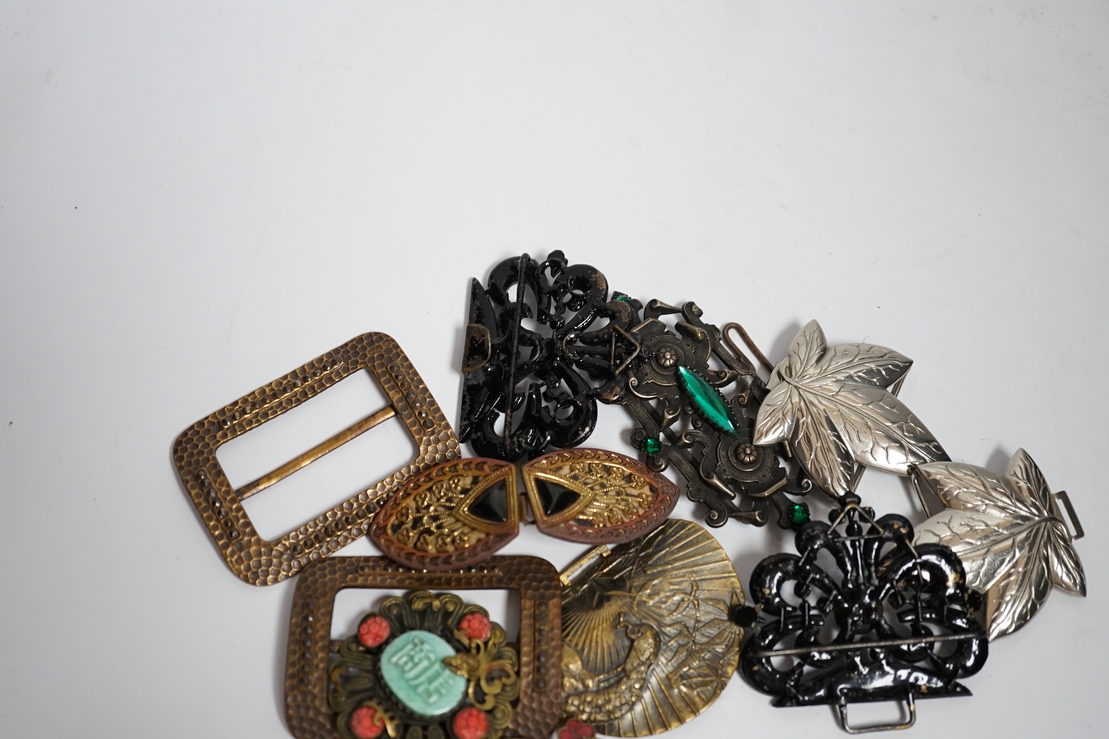 A collection of 20th century and later buckles including jet, Art Deco paste, Japanese Satsuma and two gilt metal and enamel examples